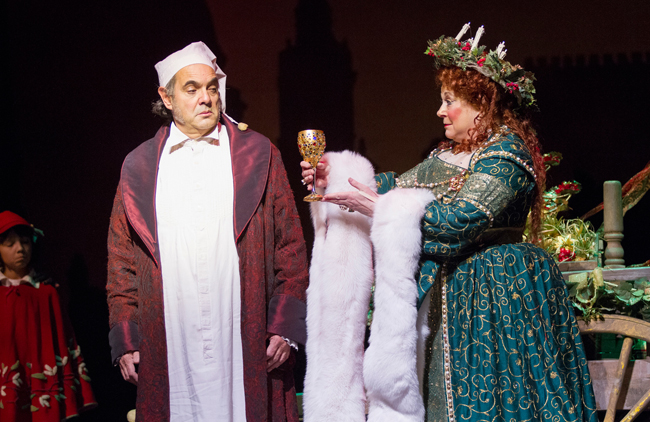 Edward Gero as Scrooge and Anne Stone as the Ghost of Christmas Present in “A Christmas Carol” at Ford’s Theatre. Photo by Scott Suchman.