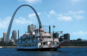 View of a riverboat and the Gateway Arch from the Mississippi River, Explore St. Louis