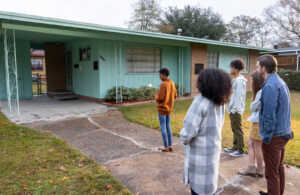 A group of students outside the Medgar and Myrlie Evers Home National Monument in Jackson, Mississippi
