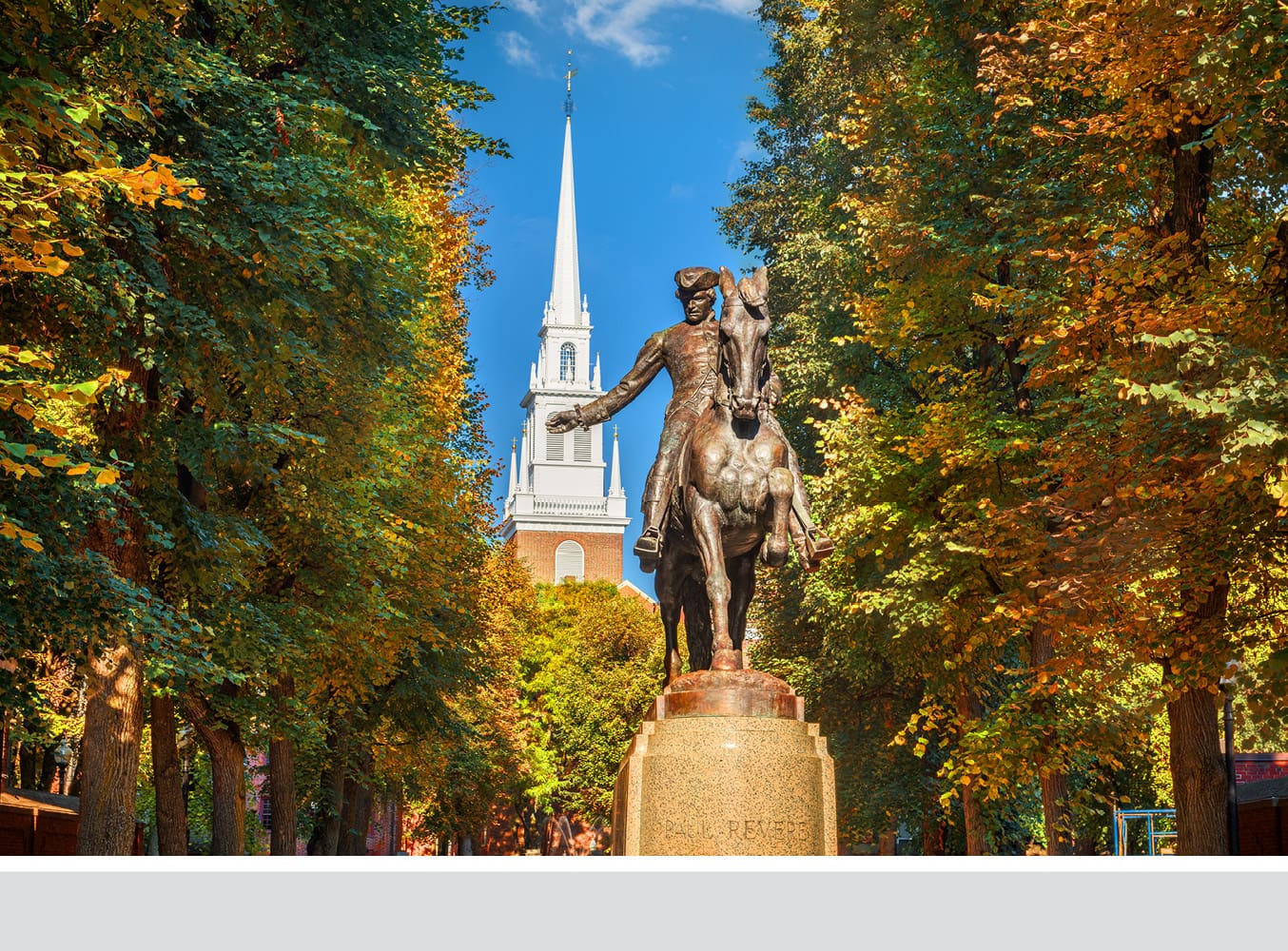 A statue of Paul Revere in front of the Old North Church
